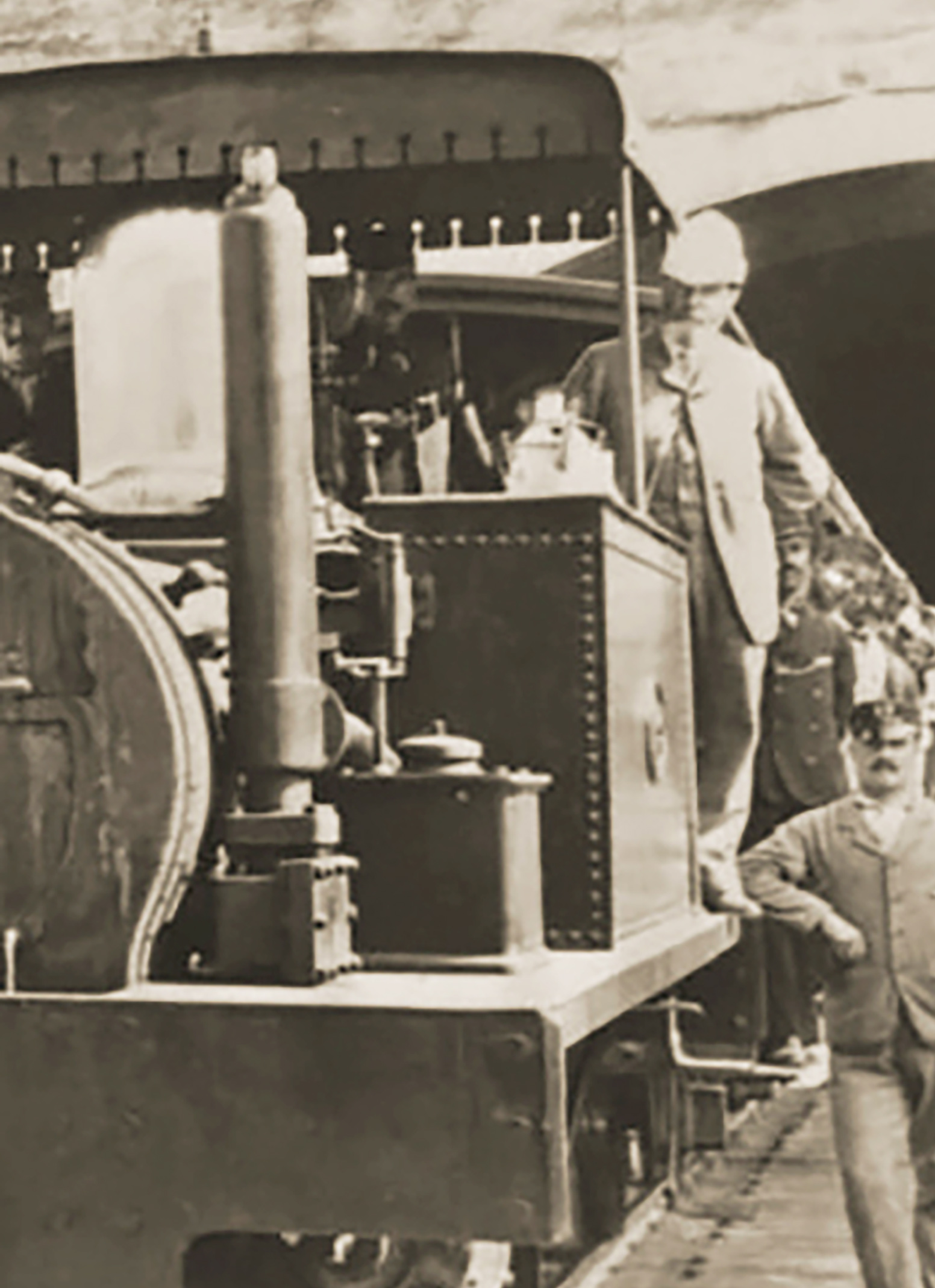 The engineer, Frank Geneste, by then appointed the railway's General Manager and Engineer, is believed to be the gentleman in the white pith helmet, standing on the engine footplate at Valletta in 1883.