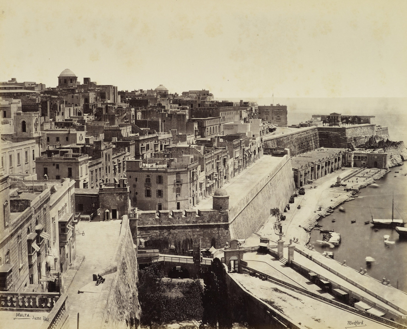 The ditch at Marina Gate, seen here in in the foreground in 1862, was the proposed terminus in Andrew's proposals. It would have proved more convenient for traffic from the docks and Three Cities, but required passage through less salubrious parts of the capital to reach it. (The Royal Collection)
