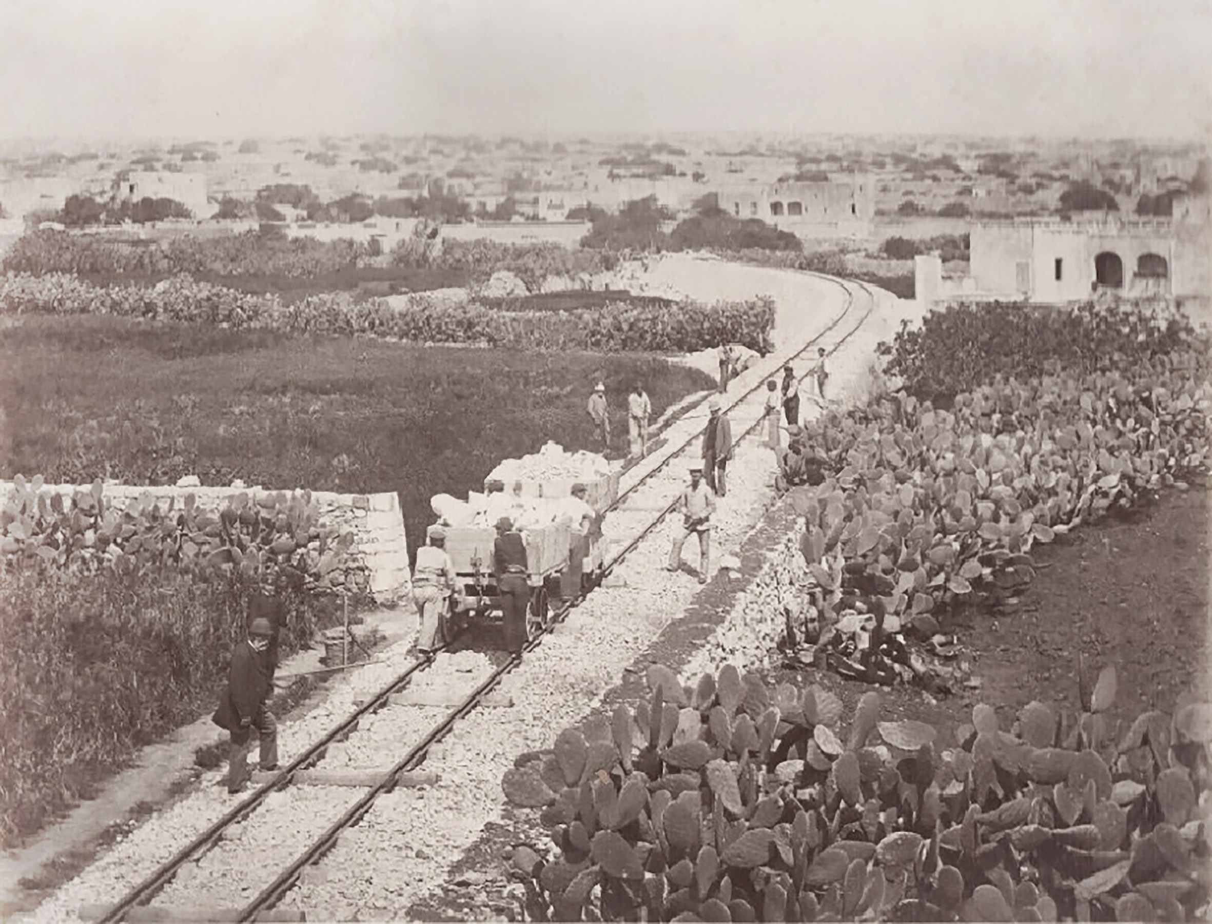 Construction approaches Tal-Fatati in April 1882, one of the other locations selected for photos taken to convince investors back in England that the line was well progressed. However, close inspection suggests  the embankment stops abruptly at a field boundary in the distance, presumably awaiting final purchase of the land. Msida station would be built on that spot shortly.