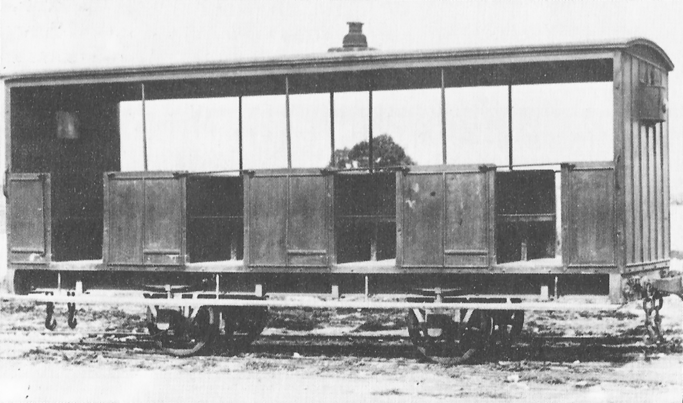 Courts ruled that rollingstock and locomotives were to be put up for auction to recompense the Malta Railway Company's creditors. Gerald Strickland ensured that the Government was the winning bidder for all lots, ensuring the railway assets remained intact. This photo of one of the original workmen's  carriages was taken recording the vehicles before sale.