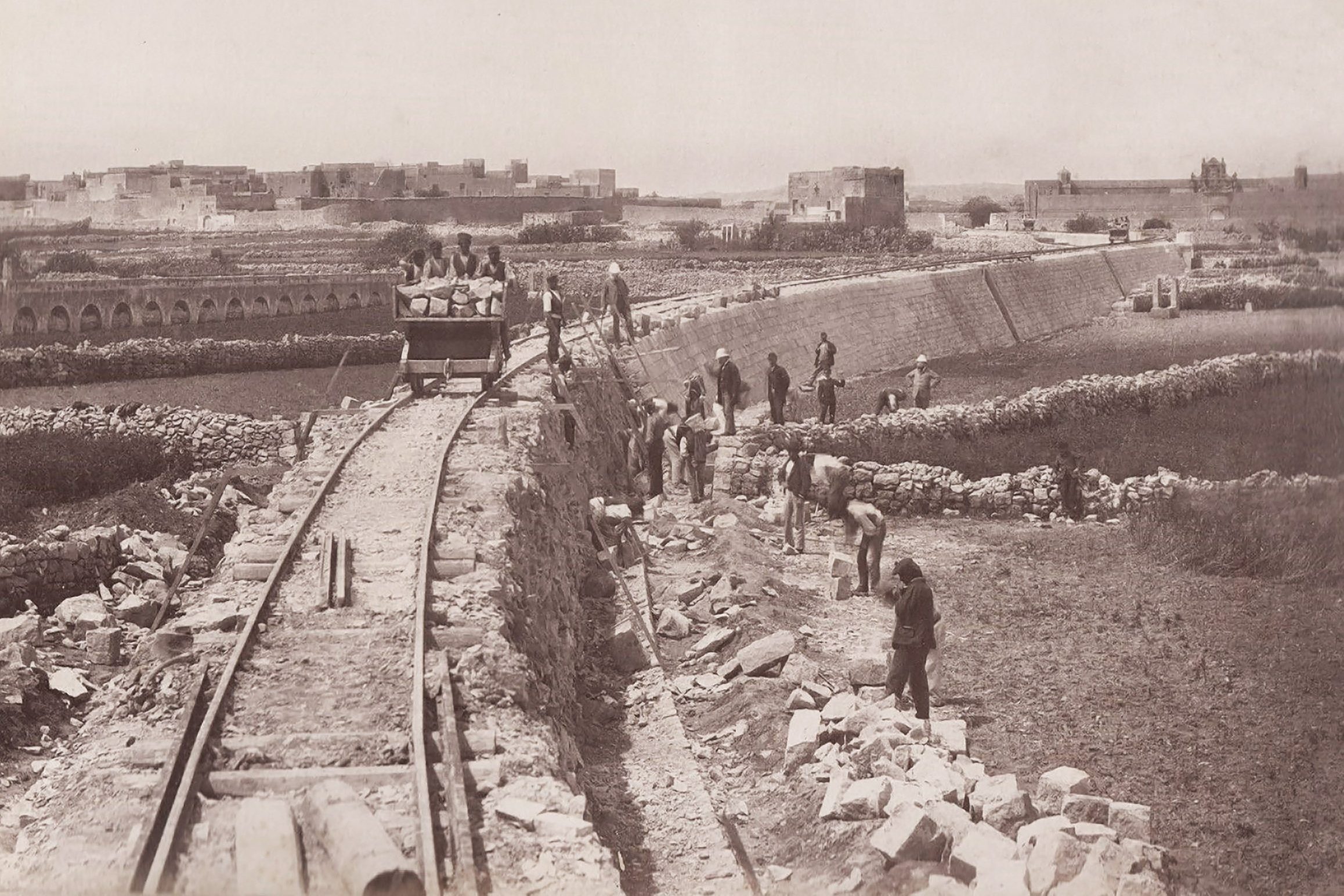 One of the photographs taken in April 1881 to reassure investors of progress. This one shows the substantial embankment just east of Attard station. The gentlemen in white helmets are engineers inspecting the works, amongst whom is Frank Geneste, who managed to insert himself prominently in most of the series.