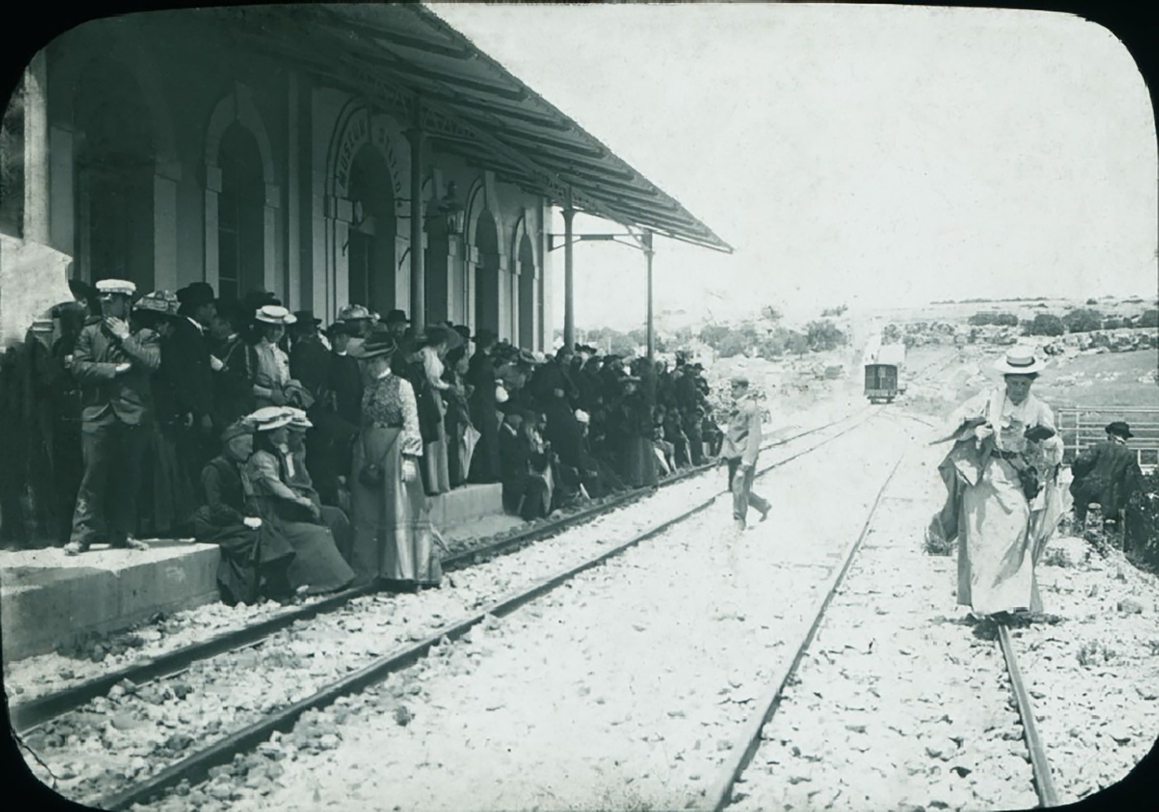 Museum station in immaculate condition shortly after the Mtarfa extension opened in 1900. The event depicted is unknown, but, in its busyness, suggests how the opening might have appeared. (Malta Railway Foundation)