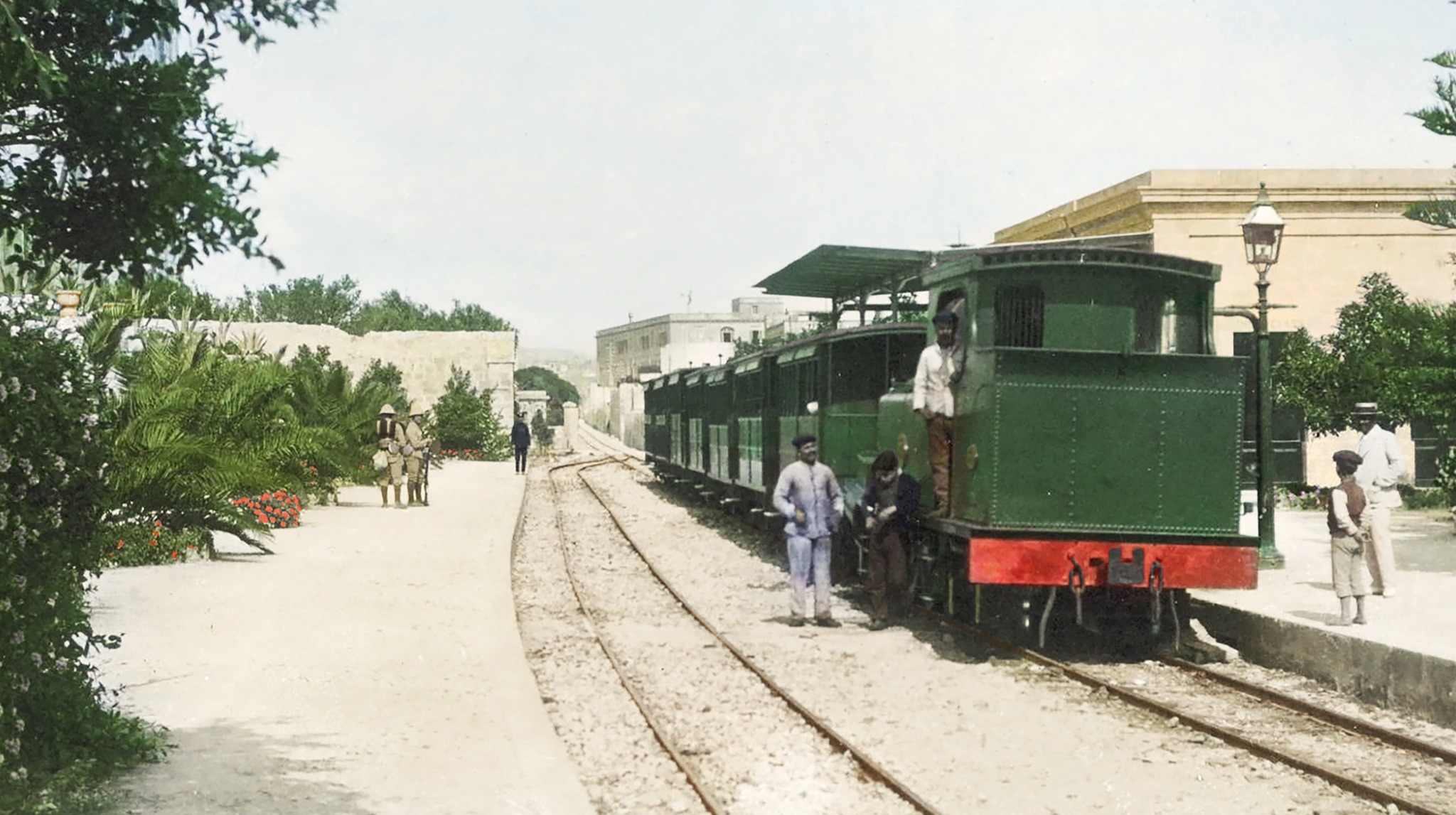 Photo of Birkirkara railway station in Malta with a train standing at the platform heading towards Valletta.