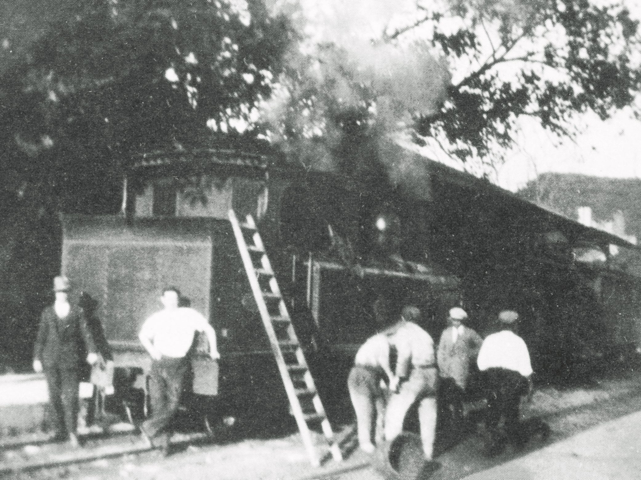 Coal being manhandled into the coal bunker of a Beyer Peacock at Hamrun station, circa 1930. Wicker baskets were used for the job of shifting fuel short distances around the yard from stockpiles on the north side of the shed.